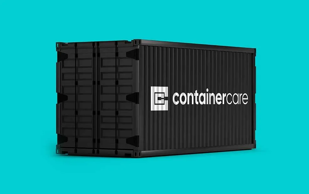 Container Care–branded black 20ft shipping container on a teal studio backdrop