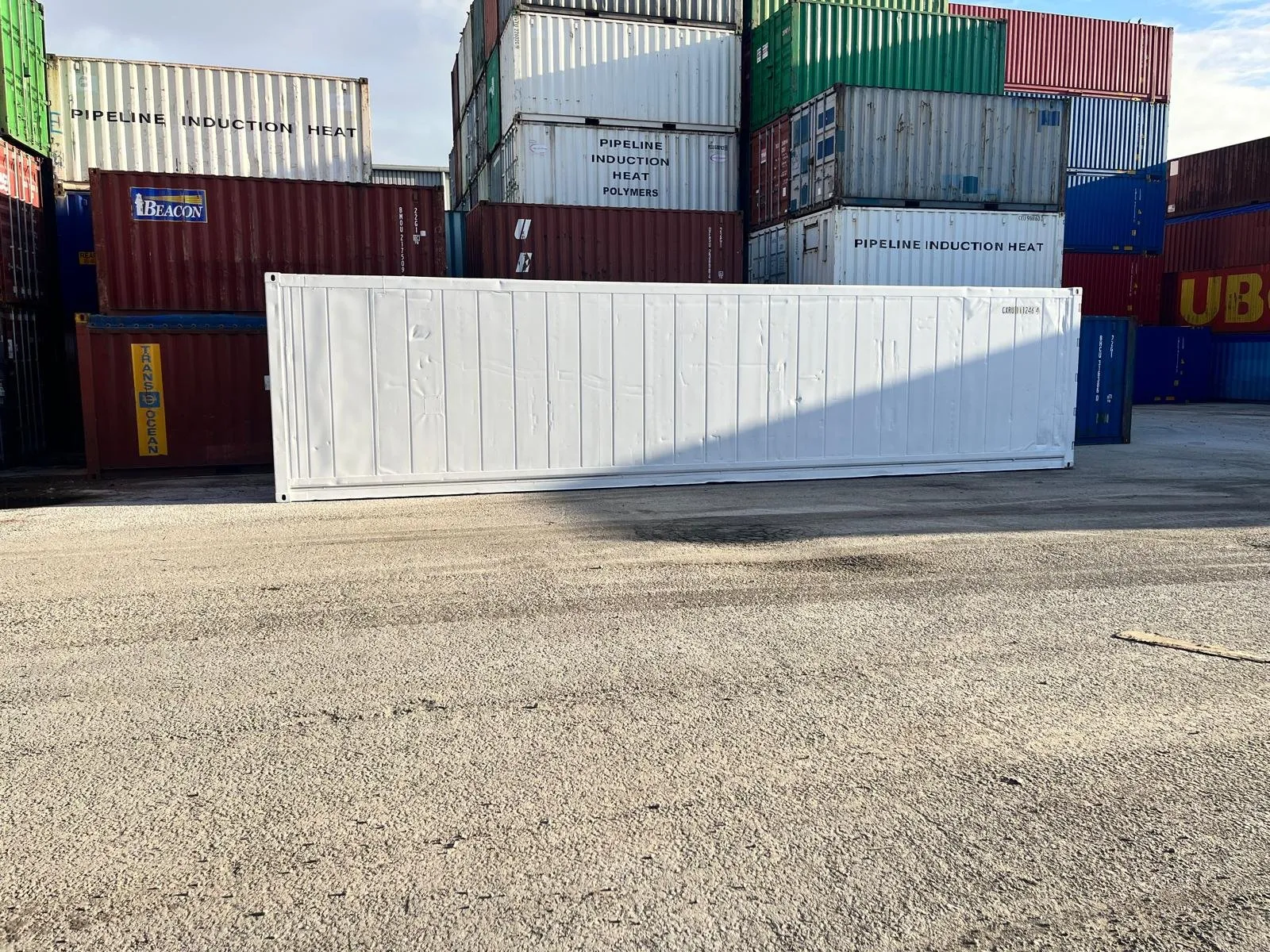 Refrigerated cargo container freshly resprayed in white